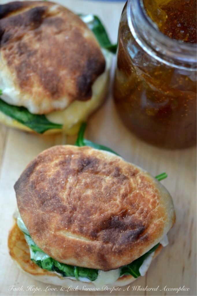 Fig and Brie Breakfast Sandwiches - This is no ordinary bacon, egg, and cheese sandwich recipe, these sandwiches take things to a whole new level. It all starts with perfectly toasted English muffins, slathered with a generous amount of fig jam or preserves. Next comes Canadian bacon, perfectly fried eggs, a handful of fresh spinach leaves, and a generous amount of melted brie cheese. This is the type of sandwich you won't mind waking up early for.