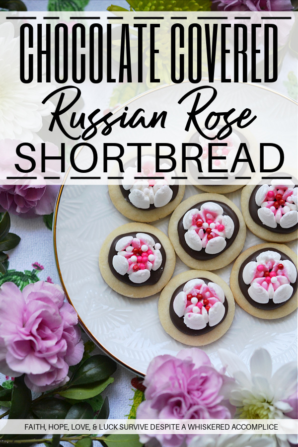 Chocolate Covered Russian Rose Shortbread - These gorgeous shortbread cookies are covered with melted dark chocolate and then decorated with beautiful handmade royal icing flowers, made using a Russian piping tip. For an easier-to-make version, you can forgo the royal icing flowers and decorate these miniature shortbread cookies with sprinkles, candy hearts, or any festive holiday candies.