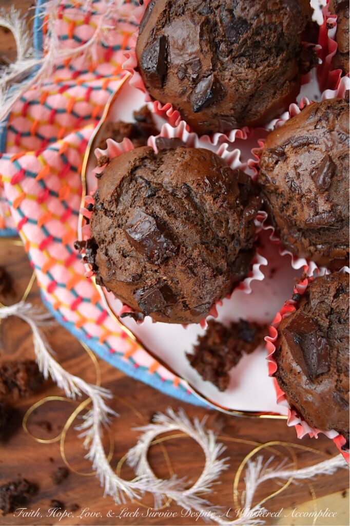 Dove Dark Chocolate Chunk Cakey Muffins - Say goodbye to boring breakfast options and hello to decadent chocolate muffins that will satisfy your sweet tooth without being too sugary. Made with Dove Dark Chocolate Promises, these muffins strike the perfect balance between dense and cakey, with a rich and chocolatey flavor that will leave you wanting more. And the best part? They're not overly sweet, making them the perfect breakfast treat. Paired with fresh fruit, this is one breakfast muffin you'll be excited to roll out of bed for.