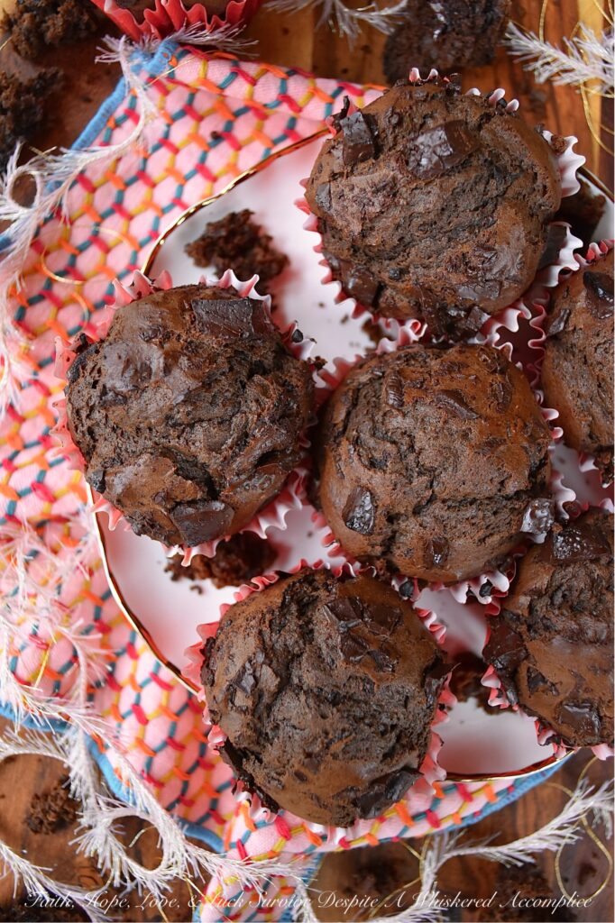 Dove Dark Chocolate Chunk Cakey Muffins - Say goodbye to boring breakfast options and hello to decadent chocolate muffins that will satisfy your sweet tooth without being too sugary. Made with Dove Dark Chocolate Promises, these muffins strike the perfect balance between dense and cakey, with a rich and chocolatey flavor that will leave you wanting more. And the best part? They're not overly sweet, making them the perfect breakfast treat. Paired with fresh fruit, this is one breakfast muffin you'll be excited to roll out of bed for.