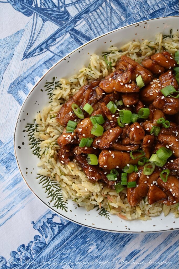 Sweet Whiskey Skillet Teriyaki Chicken - This easy skillet teriyaki chicken recipe requires minimal prep and is perfect for hectic evenings when you're craving takeout but still want to serve your family a home-cooked meal. Featuring a simple homemade teriyaki sauce flavored with sweet honey and a hint of smoky whiskey, this recipe transforms boneless, skinless chicken thighs into a quick weeknight meal that will surely become a family favorite.