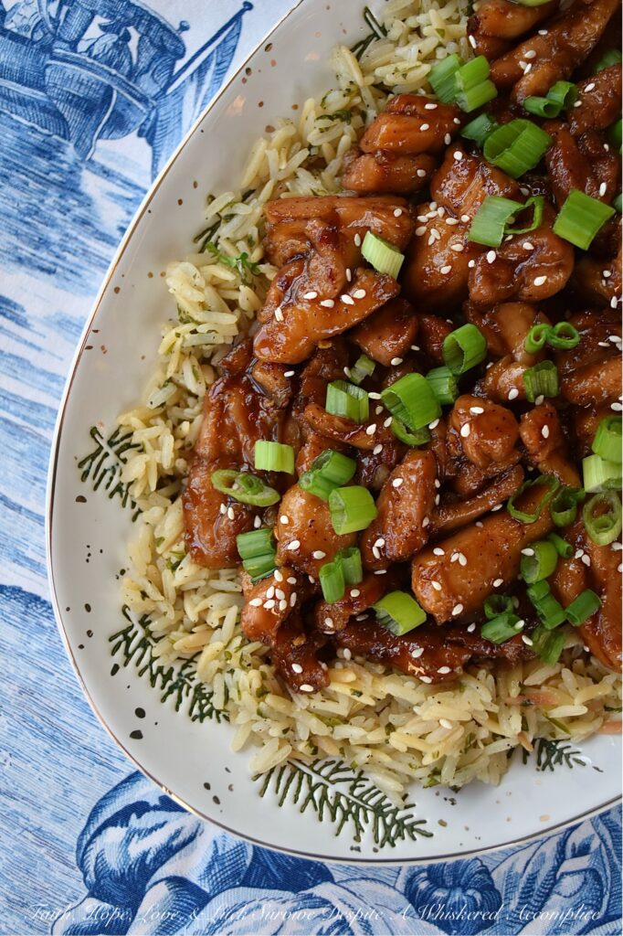 Sweet Whiskey Skillet Teriyaki Chicken - This easy skillet teriyaki chicken recipe requires minimal prep and is perfect for hectic evenings when you're craving takeout but still want to serve your family a home-cooked meal. Featuring a simple homemade teriyaki sauce flavored with sweet honey and a hint of smoky whiskey, this recipe transforms boneless, skinless chicken thighs into a quick weeknight meal that will surely become a family favorite.