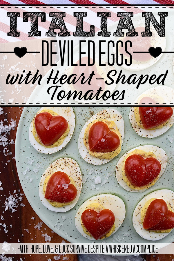 Italian Deviled Eggs with Heart-Shaped Tomatoes - These creamy Italian-seasoned deviled eggs are perfect for weddings, anniversary parties, Galentine's celebrations, Valentine's Day, or as a way to show your loved ones just how much you love them. Topped with a heart-shaped tomato for an added festive touch, these deviled eggs are as gorgeous and whimsical as they are delicious. Their slightly sweet honey and Italian seasoning filling will have everyone falling in love at first bite.