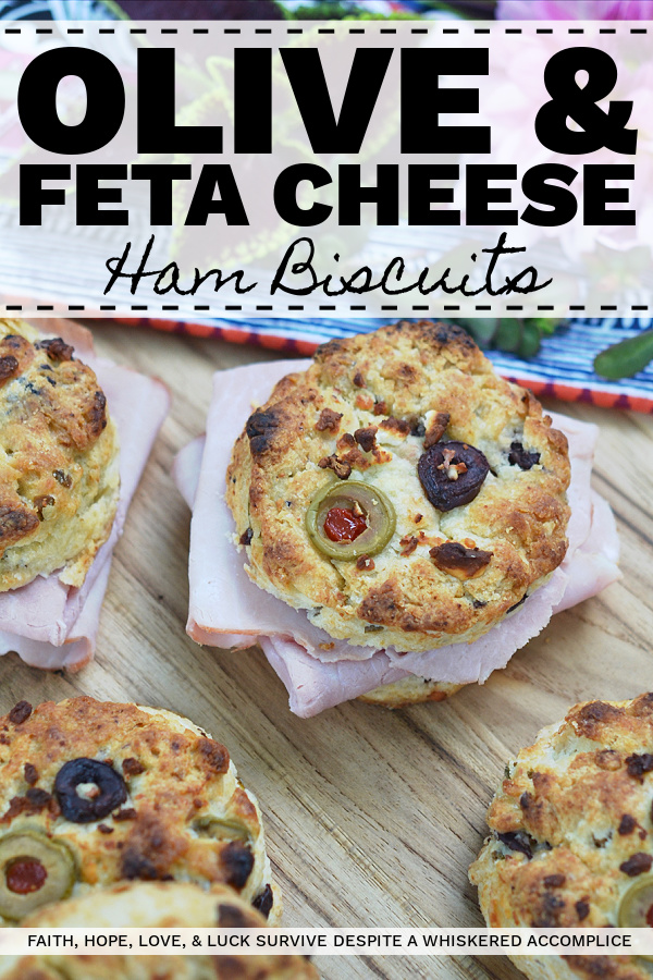 Olive & Feta Cheese Ham Biscuits - These southern ham biscuits are given a unique Mediterranean twist with the addition of olives and feta cheese. Whether you eat them for breakfast, lunch, or dinner, you're sure to enjoy these flavorful crumbly and buttery biscuit sandwiches.