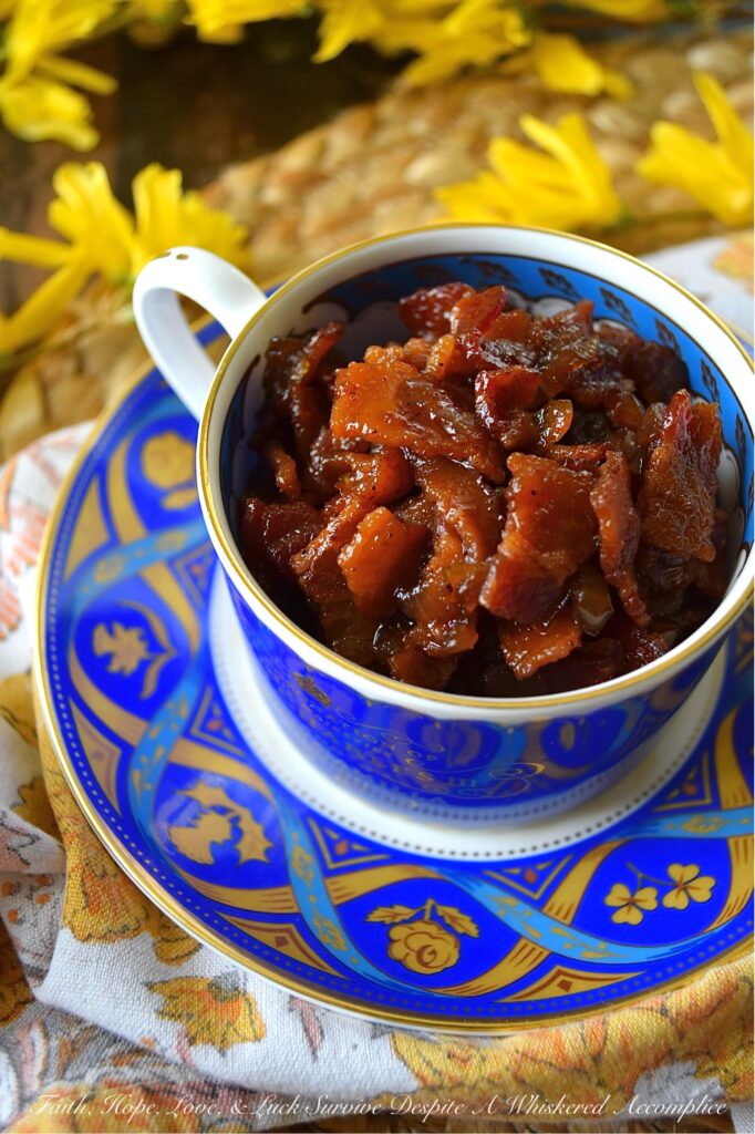 Bourbon & Onion Bacon Jam - This mouthwatering condiment combines the rich saltiness of bacon with the sweetness of yellow onions, smoky chili powder, and a touch of maple syrup and brown sugar. A splash of apple cider vinegar and a hint of bourbon also add a delightful tang and boozy kick to this delectable bacon jam. Whether used as a sandwich spread, mixed with cream cheese for a cracker topping, or even as a unique addition to deviled eggs, this irresistible Bourbon & Onion Bacon jam is guaranteed to have you coming back for more.