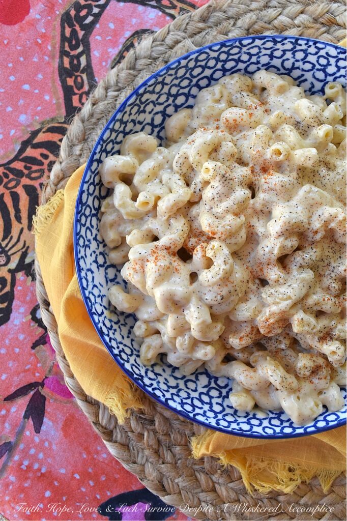 Creamy Simple Stovetop Gouda Mac & Cheese - This creamy mac and cheese recipe is made with just a handful of simple ingredients, including gouda cheese, milk, and heavy whipping cream. The addition of black pepper and sweet paprika gives this dish an extra kick of flavor, but can easily be left out for those who prefer a milder taste. Plus, you can easily swap in your preferred variety of pasta, making this recipe versatile and customizable. Whether you're looking for a quick weeknight meal or a comforting cheesy side dish to satisfy your cravings, this creamy stovetop macaroni and cheese is sure to become a family favorite.