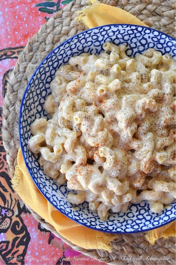 Creamy Simple Stovetop Gouda Mac & Cheese - This creamy mac and cheese recipe is made with just a handful of simple ingredients, including gouda cheese, milk, and heavy whipping cream. The addition of black pepper and sweet paprika gives this dish an extra kick of flavor, but can easily be left out for those who prefer a milder taste. Plus, you can easily swap in your preferred variety of pasta, making this recipe versatile and customizable. Whether you're looking for a quick weeknight meal or a comforting cheesy side dish to satisfy your cravings, this creamy stovetop macaroni and cheese is sure to become a family favorite.