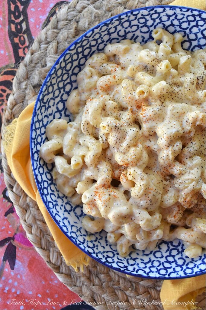 Creamy Simple Stovetop Gouda Mac & Cheese - This creamy mac and cheese recipe is made with just a handful of simple ingredients, including gouda cheese, milk, and heavy whipping cream. The addition of black pepper and sweet paprika gives this dish an extra kick of flavor, but can easily be left out for those who prefer a milder taste. Plus, you can easily swap in your preferred variety of pasta, making this recipe versatile and customizable. Whether you're looking for a quick weeknight meal or a comforting cheesy side dish to satisfy your cravings, this creamy stovetop macaroni and cheese is sure to become a family favorite.