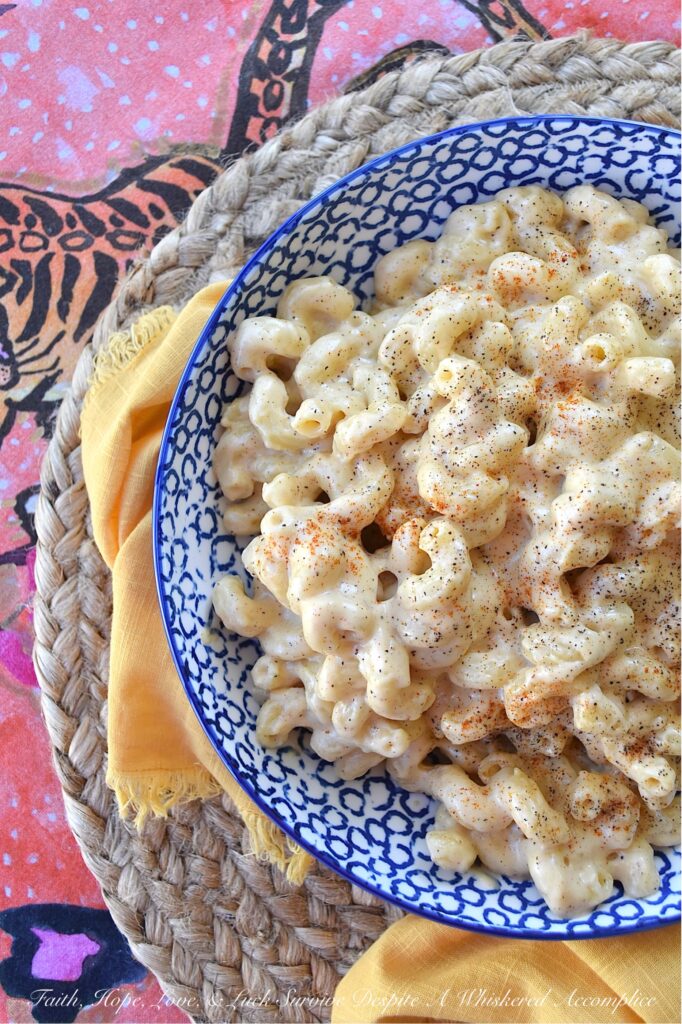 Creamy Simple Stovetop Gouda Mac & Cheese - This creamy mac and cheese recipe is made with just a handful of simple ingredients, including gouda cheese, milk, and heavy whipping cream. The addition of black pepper and sweet paprika gives this dish an extra kick of flavor, but can easily be left out for those who prefer a milder taste. Plus, you can easily swap in your preferred variety of pasta, making this recipe versatile and customizable. Whether you're looking for a quick weeknight meal or a comforting cheesy side dish to satisfy your cravings, this creamy stovetop macaroni and cheese is sure to become a family favorite.