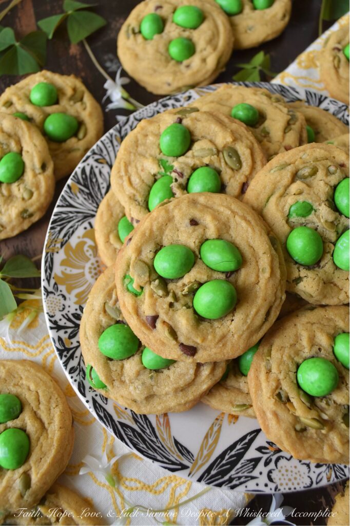 Lucky St. Patrick's Day M&M Cookies with Pepitas - St. Patrick's Day is just around the corner, and what better way to celebrate than with these Lucky St. Patrick's Day M&M Cookies with Pepitas? These chewy and crunchy cookies are a delightful combination of green Milk Chocolate M&M's, miniature semi-sweet chocolate chips, and nutty roasted salted pepitas. Topped with green Peanut M&M's for an extra pop of color and crunch, these festive and delicious cookies are sure to be a hit at any St. Patrick's Day gathering and are the perfect way to spread some lucky holiday cheer.