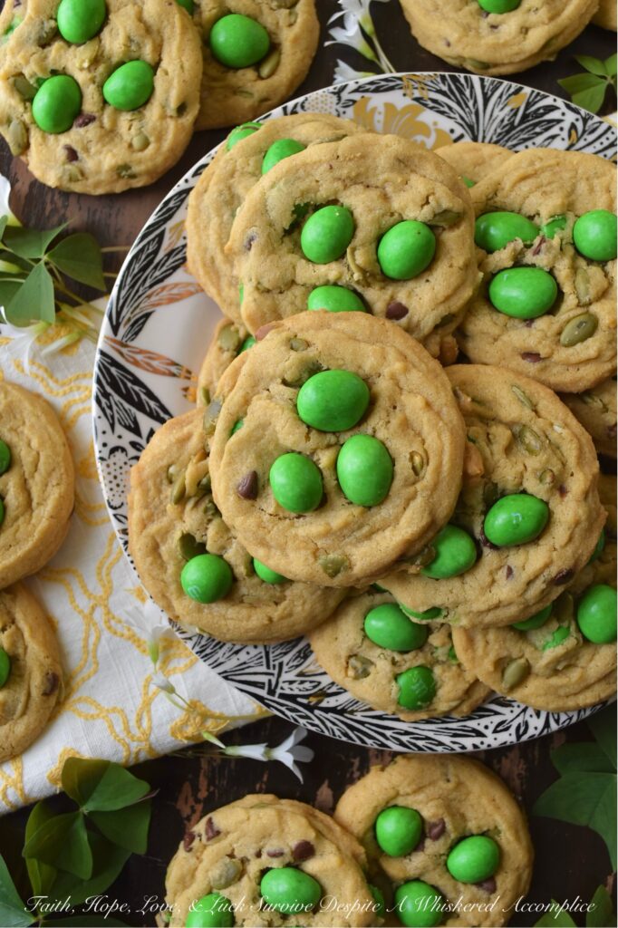 Lucky St. Patrick's Day M&M Cookies with Pepitas - St. Patrick's Day is just around the corner, and what better way to celebrate than with these Lucky St. Patrick's Day M&M Cookies with Pepitas? These chewy and crunchy cookies are a delightful combination of green Milk Chocolate M&M's, miniature semi-sweet chocolate chips, and nutty roasted salted pepitas. Topped with green Peanut M&M's for an extra pop of color and crunch, these festive and delicious cookies are sure to be a hit at any St. Patrick's Day gathering and are the perfect way to spread some lucky holiday cheer.