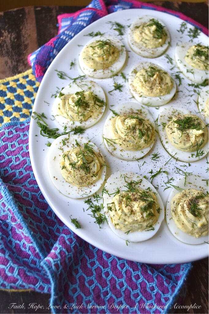 Fresh Dill Deviled Eggs with a Hint of Lemon - This easy-to-make recipe delivers a sophisticated twist on a familiar favorite, perfect for any gathering, from casual potlucks to elegant dinners. This recipe takes the classic deviled egg and elevates it with the bright, earthy flavor of fresh dill along with the subtle hint of citrusy lemon zest and tart lemon juice. Whether you're hosting an elegant brunch, a casual gathering, or simply seeking an extraordinary appetizer to elevate your next meal, these deviled eggs are destined to become a crowd-pleaser.