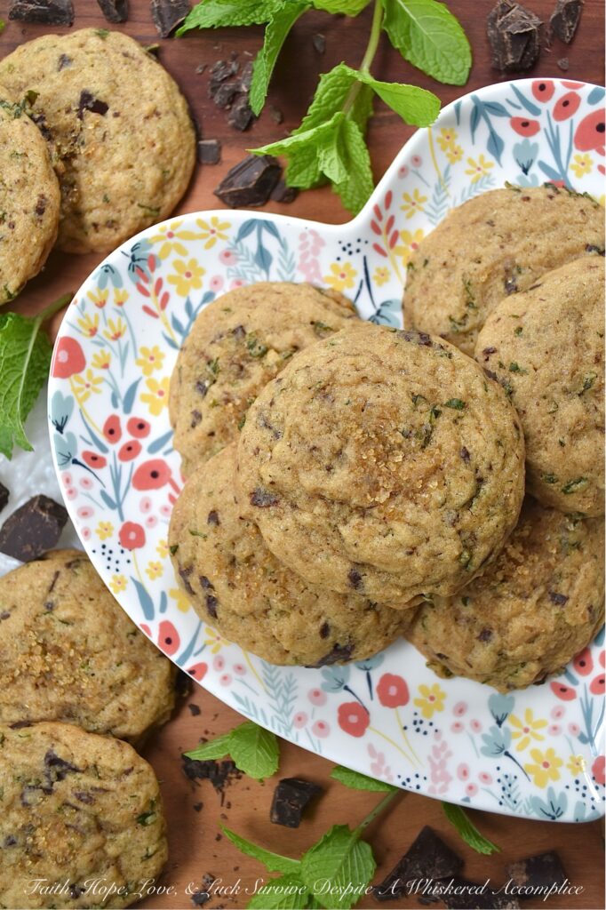 Chocolate Chunk Cookies with Fresh Mint - Imagine soft, chewy brown sugar cookies, bursting with the refreshing taste of fresh mint. Now, add in just the right amount of roughly chopped rich chocolate chunks. These chocolate chunk cookies with fresh mint are the epitome of summer's sweet indulgence, offering a cool and minty twist on the classic brown sugar cookie. If your backyard garden or porch planters are overflowing with fresh mint, or you just so happen to stumble upon gorgeous fresh mint at your local market or grocery store, these cookies are a must-bake.