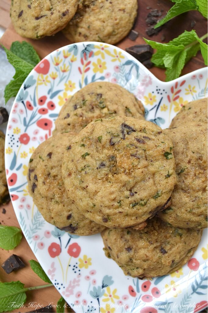 Chocolate Chunk Cookies with Fresh Mint - Imagine soft, chewy brown sugar cookies, bursting with the refreshing taste of fresh mint. Now, add in just the right amount of roughly chopped rich chocolate chunks. These chocolate chunk cookies with fresh mint are the epitome of summer's sweet indulgence, offering a cool and minty twist on the classic brown sugar cookie. If your backyard garden or porch planters are overflowing with fresh mint, or you just so happen to stumble upon gorgeous fresh mint at your local market or grocery store, these cookies are a must-bake.