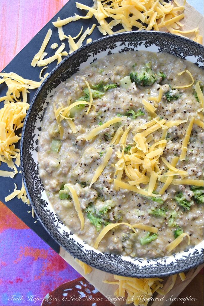 Cheeseburger Broccoli Rice Soup Casserole - This one-pot recipe seamlessly combines the rich flavors of a cheeseburger with the creamy goodness of broccoli cheddar soup and the heartiness of a rice casserole, blurring the line between soup and casserole with its thick, rich, and creamy rice texture. Featuring savory ground beef, melted cheddar cheese, decadent heavy whipping cream, and a generous amount of chopped broccoli, this recipe is perfect for those nights when you're craving something indulgent yet almost effortless.