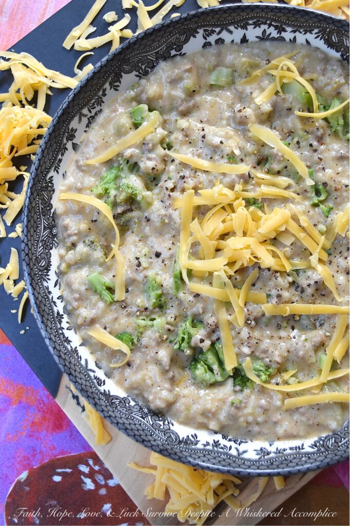 Cheeseburger Broccoli Rice Soup Casserole - This one-pot recipe seamlessly combines the rich flavors of a cheeseburger with the creamy goodness of broccoli cheddar soup and the heartiness of a rice casserole, blurring the line between soup and casserole with its thick, rich, and creamy rice texture. Featuring savory ground beef, melted cheddar cheese, decadent heavy whipping cream, and a generous amount of chopped broccoli, this recipe is perfect for those nights when you're craving something indulgent yet almost effortless.