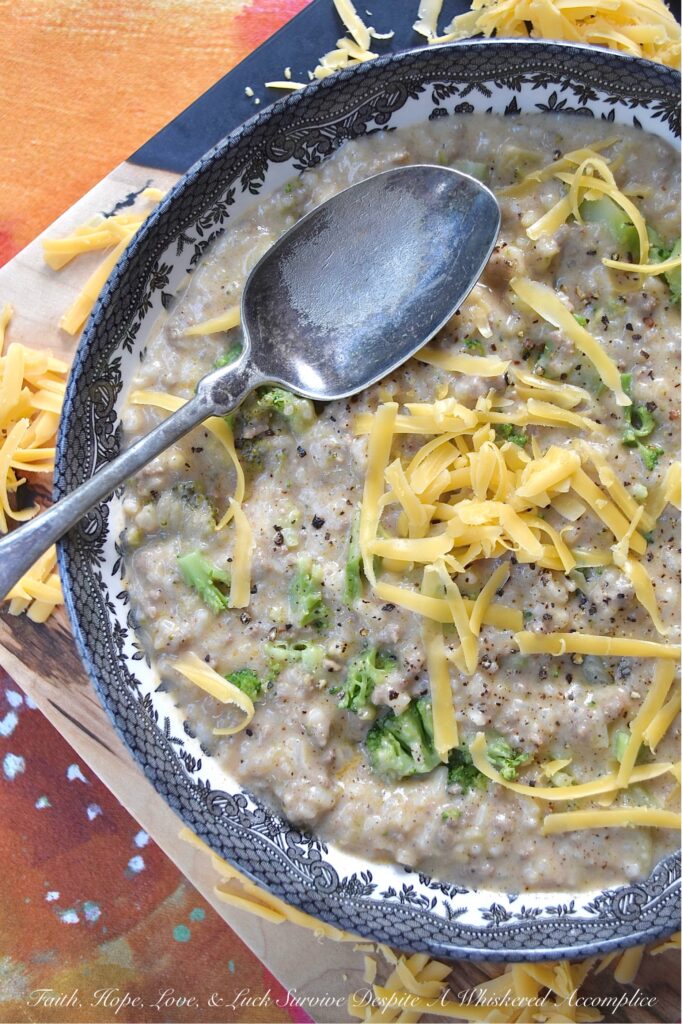 Cheeseburger Broccoli Rice Soup Casserole - This one-pot recipe seamlessly combines the rich flavors of a cheeseburger with the creamy goodness of broccoli cheddar soup and the heartiness of a rice casserole, blurring the line between soup and casserole with its thick, rich, and creamy rice texture. Featuring savory ground beef, melted cheddar cheese, decadent heavy whipping cream, and a generous amount of chopped broccoli, this recipe is perfect for those nights when you're craving something indulgent yet almost effortless.