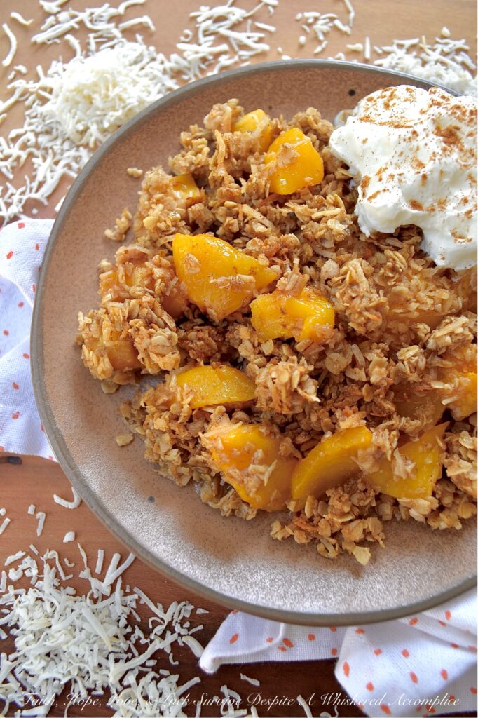 Unsweetened Coconut Oatmeal Peach Crisp - You just can't beat a warm, comforting, bubbly oatmeal peach crisp fresh out of the oven, especially if it's topped with a crunchy buttery topping made with quick-cooking oats, unsweetened shredded coconut, brown sugar, cinnamon, melted butter, and vanilla. And, since you can use either fresh or frozen peaches for this fruity dessert, this is one simple and easy recipe that you'll be able to enjoy year-round.