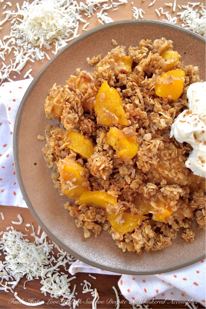 Unsweetened Coconut Oatmeal Peach Crisp - You just can't beat a warm, comforting, bubbly oatmeal peach crisp fresh out of the oven, especially if it's topped with a crunchy buttery topping made with quick-cooking oats, unsweetened shredded coconut, brown sugar, cinnamon, melted butter, and vanilla. And, since you can use either fresh or frozen peaches for this fruity dessert, this is one simple and easy recipe that you'll be able to enjoy year-round.