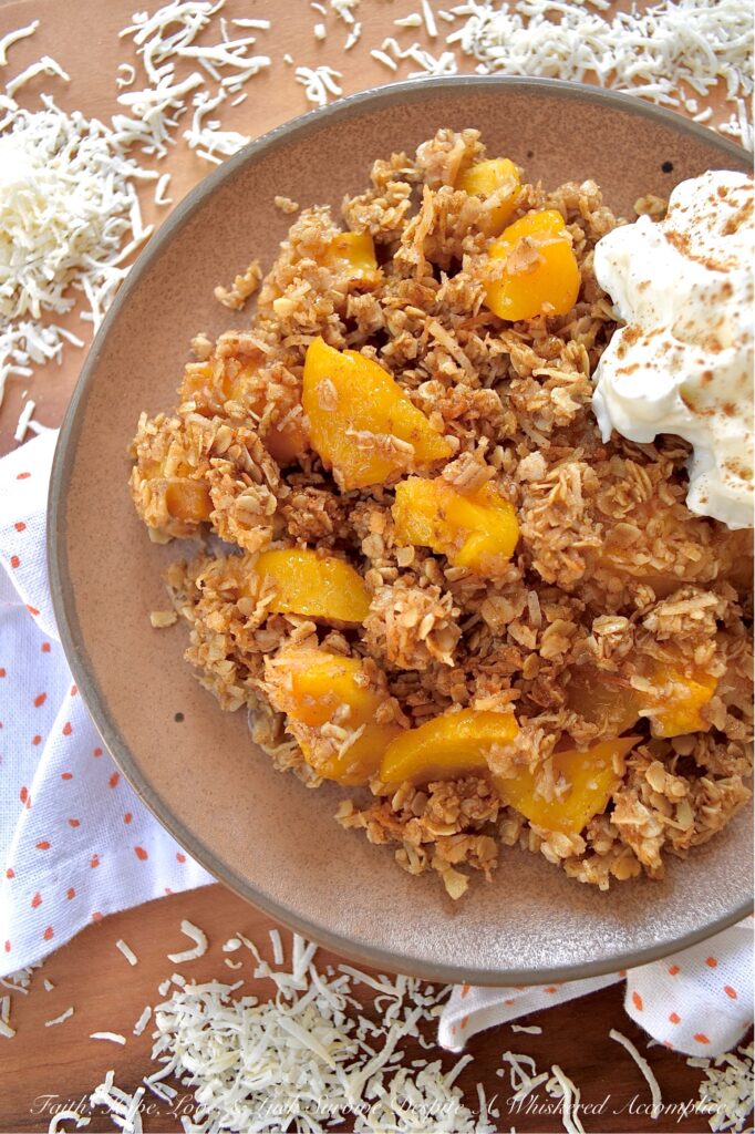 Unsweetened Coconut Oatmeal Peach Crisp - You just can't beat a warm, comforting, bubbly oatmeal peach crisp fresh out of the oven, especially if it's topped with a crunchy buttery topping made with quick-cooking oats, unsweetened shredded coconut, brown sugar, cinnamon, melted butter, and vanilla. And, since you can use either fresh or frozen peaches for this fruity dessert, this is one simple and easy recipe that you'll be able to enjoy year-round.