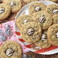 X's & O's (Hugs & Kisses) Brown Sugar Cookies - Nothing quite compares to the warmth of a hug or the sweetness of a kiss, and with these X's & O's Brown Sugar Cookies, you won't have to choose between the two. These cookies are topped with Hershey's Hugs and infused with the rich, melty goodness of roughly chopped Milk Chocolate Hershey’s Kisses. The unexpected addition of Grape Nuts cereal gives these buttery, crunchy, and chocolatey hugs and kisses cookies a delightful twist that makes them almost impossible not to fall head over heels in love with.