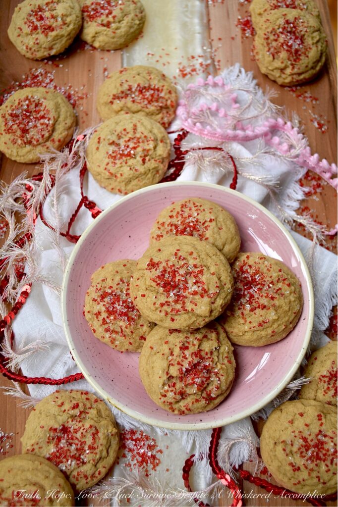 Red & White Sparkling Brown Sugar Cookies - These easy-to-make brown sugar cookies are soft, chewy, and made with simple pantry staples that you probably already have stashed in your kitchen cabinets. They get a dazzling holiday makeover with a sprinkle of vibrant red and white sparkling sugar, adding a festive flair and a little crunch that will make every bite feel like a celebration.