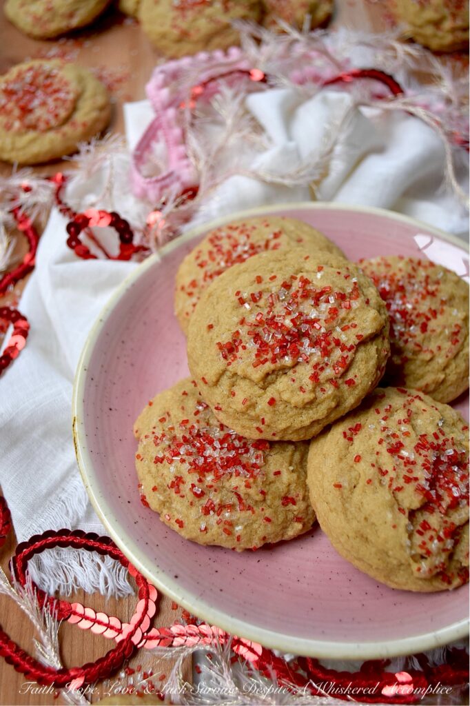 Red & White Sparkling Brown Sugar Cookies - These easy-to-make brown sugar cookies are soft, chewy, and made with simple pantry staples that you probably already have stashed in your kitchen cabinets. They get a dazzling holiday makeover with a sprinkle of vibrant red and white sparkling sugar, adding a festive flair and a little crunch that will make every bite feel like a celebration.