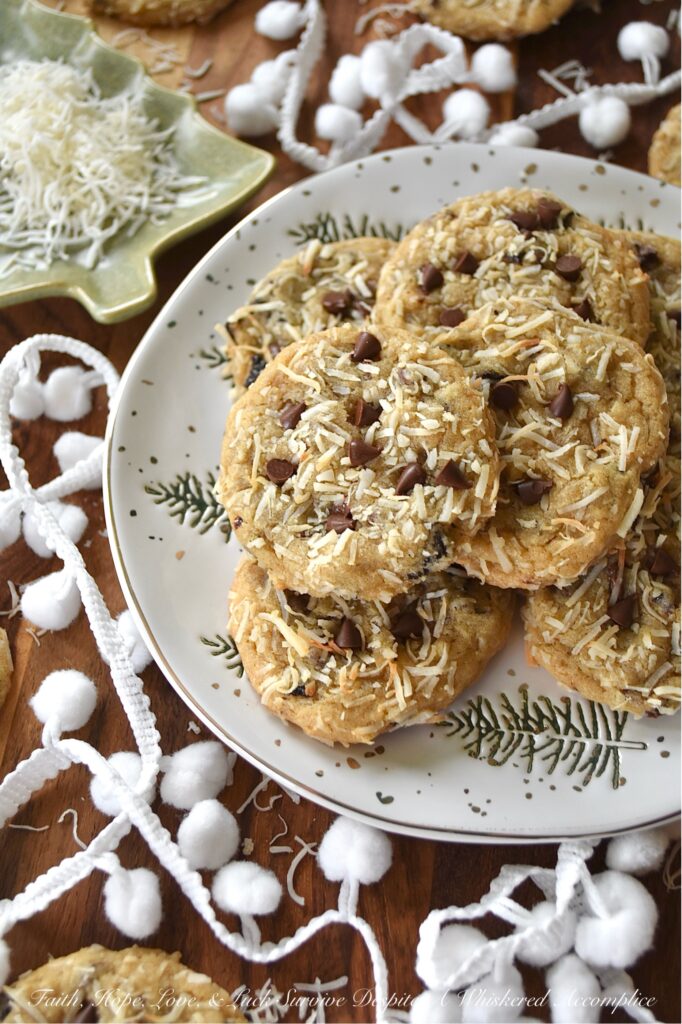 Coconut & Dried Cherry Chocolate Chip Cookies - If you're on the hunt for a simple yet irresistible gussied-up brown sugar cookie recipe, look no further. Imagine biting into a warm, chewy cookie that perfectly balances rich miniature semi-sweet chocolate chips with the crunchy texture of unsweetened shredded coconut and the tart zing of dried cherries. Whether you’re baking cookies for the holidays or simply craving a sweet treat, this recipe is sure to become a cherished favorite.