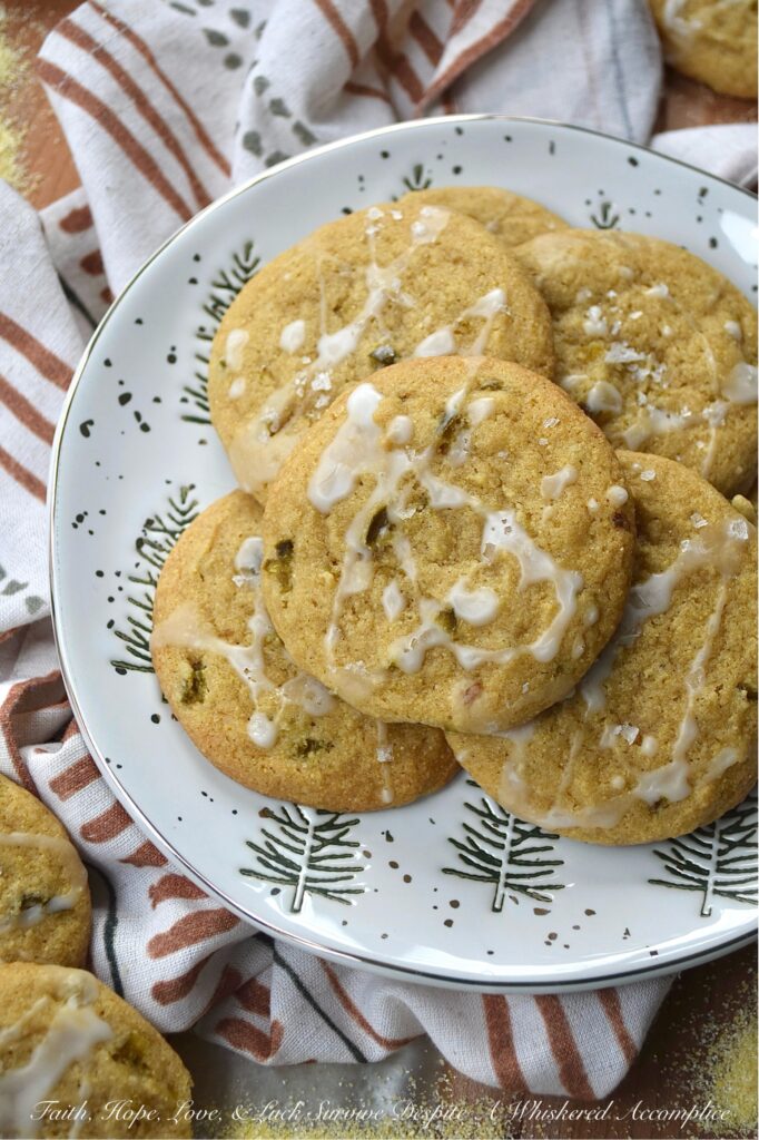 Jalapeño Yellow Cornmeal Brown Sugar Cookies - Cornbread is a classic favorite that pairs wonderfully with hearty soups, zesty chili, or fresh salads. This recipe offers a fun twist on traditional cornbread by transforming it into slightly crunchy, soft, and chewy brown sugar cookies. With a touch of sweet pickled jalapeños, these yellow cornmeal cookies provide just the right amount of spicy kick. They are a delicious and unique alternative to regular cornbread and make a delightful addition to almost any meal.