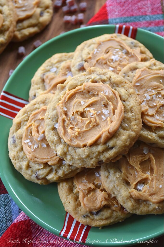 Peanut Butter Frosted Jammy Bits Cookies - These simple brown sugar cookies are no ordinary treat; they’re packed with wholesome quick-cooking oats and bursting with the tangy sweet goodness of soft, chewy raspberry jammy bits. Topped with a luscious easy-to-make peanut butter frosting and a touch of flaky sea salt, these peanut butter-frosted brown sugar cookies are the perfect indulgence for any occasion. Be prepared to make a double batch because everyone will be asking for seconds.