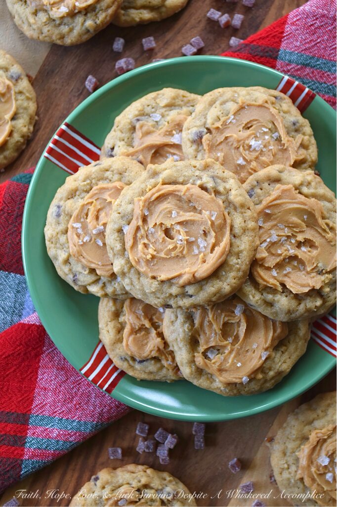 Peanut Butter Frosted Jammy Bits Cookies - These simple brown sugar cookies are no ordinary treat; they’re packed with wholesome quick-cooking oats and bursting with the tangy sweet goodness of soft, chewy raspberry jammy bits. Topped with a luscious easy-to-make peanut butter frosting and a touch of flaky sea salt, these peanut butter-frosted brown sugar cookies are the perfect indulgence for any occasion. Be prepared to make a double batch because everyone will be asking for seconds.