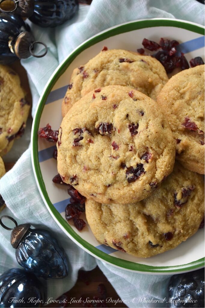 Cornmeal Dried Cranberry Brown Sugar Cookies - While many cookies are typically reserved for dessert, these brown sugar cookies encourage you to think outside of the box. Whether enjoyed alongside a warm bowl of soup, paired with a crisp salad, or as a dessert to conclude a meal, these sweet and savory cornmeal cookies are bound to become an instant favorite, no matter the time of year. With their satisfying yellow cornmeal crunch and their chewy burst of dried cranberry sweetness, they offer a unique and irresistible flavor experience.