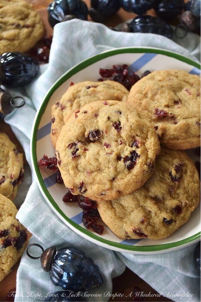 Cornmeal Dried Cranberry Brown Sugar Cookies - While many cookies are typically reserved for dessert, these brown sugar cookies encourage you to think outside of the box. Whether enjoyed alongside a warm bowl of soup, paired with a crisp salad, or as a dessert to conclude a meal, these sweet and savory cornmeal cookies are bound to become an instant favorite, no matter the time of year. With their satisfying yellow cornmeal crunch and their chewy burst of dried cranberry sweetness, they offer a unique and irresistible flavor experience.