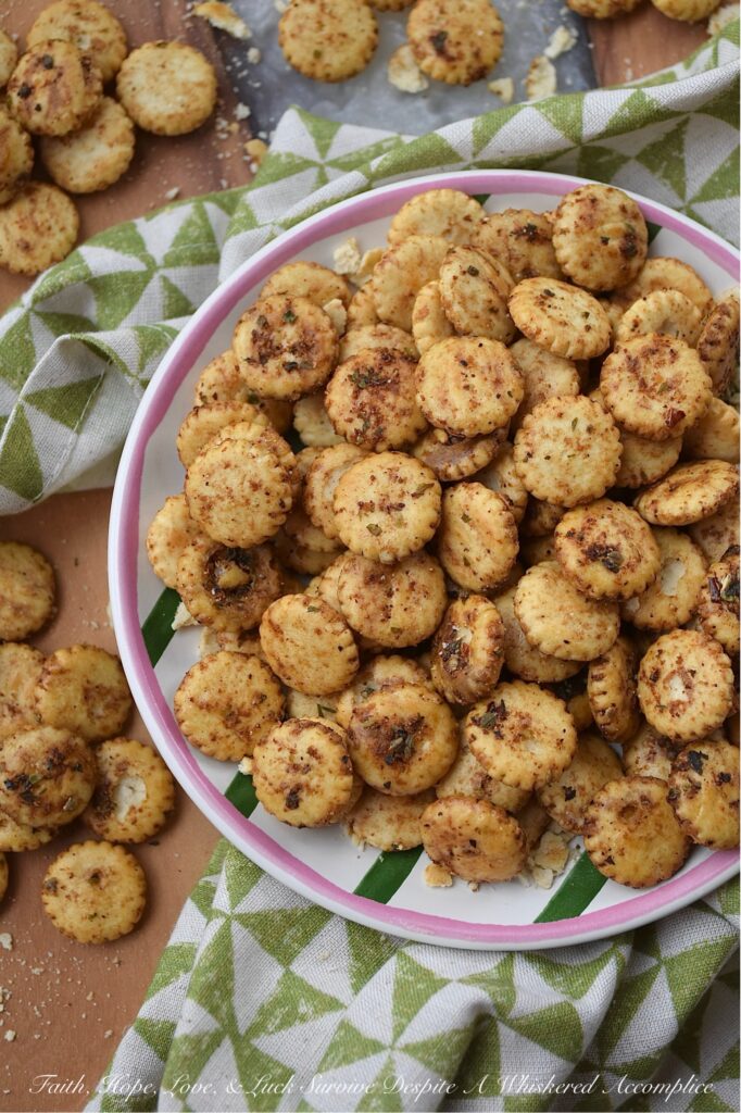 Zesty Italian Balsamic Baked Oyster Crackers - Whether you're hosting a lively game night, attending a festive holiday gathering, or simply snuggling up for a movie marathon, these savory oyster crackers are sure to be a hit. Easy to prepare and irresistibly addictive, they are the ultimate indulgence for those seeking a zesty balsamic vinegar and flavorful Italian seasoning salty snack. Baked to perfection, these zesty oyster crackers offer a savory crunch that pairs beautifully with soup or chili, making them an excellent addition to almost any meal as well.