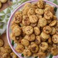 Zesty Italian Balsamic Baked Oyster Crackers - Whether you're hosting a lively game night, attending a festive holiday gathering, or simply snuggling up for a movie marathon, these savory oyster crackers are sure to be a hit. Easy to prepare and irresistibly addictive, they are the ultimate indulgence for those seeking a zesty balsamic vinegar and flavorful Italian seasoning salty snack. Baked to perfection, these zesty oyster crackers offer a savory crunch that pairs beautifully with soup or chili, making them an excellent addition to almost any meal as well.