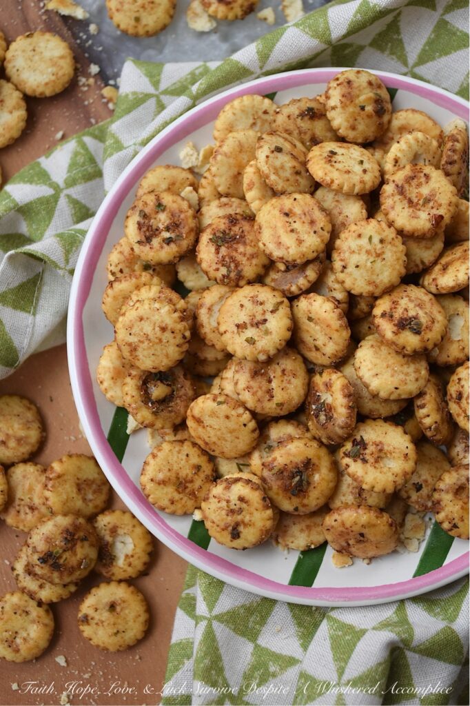 Zesty Italian Balsamic Baked Oyster Crackers - Whether you're hosting a lively game night, attending a festive holiday gathering, or simply snuggling up for a movie marathon, these savory oyster crackers are sure to be a hit. Easy to prepare and irresistibly addictive, they are the ultimate indulgence for those seeking a zesty balsamic vinegar and flavorful Italian seasoning salty snack. Baked to perfection, these zesty oyster crackers offer a savory crunch that pairs beautifully with soup or chili, making them an excellent addition to almost any meal as well.