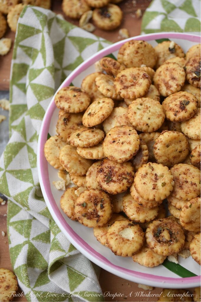 Zesty Italian Balsamic Baked Oyster Crackers - Whether you're hosting a lively game night, attending a festive holiday gathering, or simply snuggling up for a movie marathon, these savory oyster crackers are sure to be a hit. Easy to prepare and irresistibly addictive, they are the ultimate indulgence for those seeking a zesty balsamic vinegar and flavorful Italian seasoning salty snack. Baked to perfection, these zesty oyster crackers offer a savory crunch that pairs beautifully with soup or chili, making them an excellent addition to almost any meal as well.
