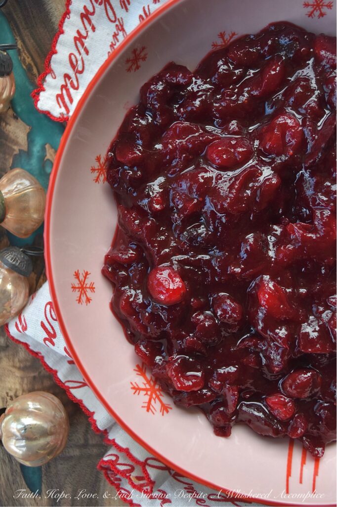Cherry & Brandy Whole Berry Cranberry Sauce - Get ready to impress your holiday guests this season with this delightful sweet and tart cherry-flavored cranberry sauce. Made with frozen cherries, brandy, and a lovely mix of granulated and light brown sugars, this fresh cranberry side dish is sure to impress. With just a dash of cinnamon, a pinch of sea salt, and a hint of vanilla, it’s bursting with flavor. Best of all, this colorful cranberry sauce is super easy to make, leaving you more time to spend with your family and friends this holiday season.