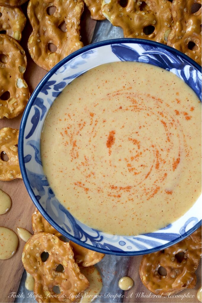 Tangy Dijon Honey Mustard Dressing with Paprika - Made with just a handful of ingredients like honey, Dijon mustard, mayonnaise, and a touch of paprika, this tangy honey mustard dressing is an equally delicious salad dressing or dip for pretzels, chicken tenders, and much more. Forget the store-bought salad dressing or honey mustard sauce; you'll be amazed at how much better this simple and easy-to-make homemade version is.