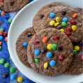 Chocolate Espresso Rainbow Brownie Cookies - Who says you have to choose between cookies and brownies when it’s time for dessert? These super-chocolatey cookies are thin, chewy, and oh-so-delicious, with a glossy, crackled finish that reminds you of your favorite brownies. A hint of espresso perfectly complements the rich chocolate cookie flavor, while vibrant Milk Chocolate M&M's Minis candies add a cheerful pop of rainbow color.