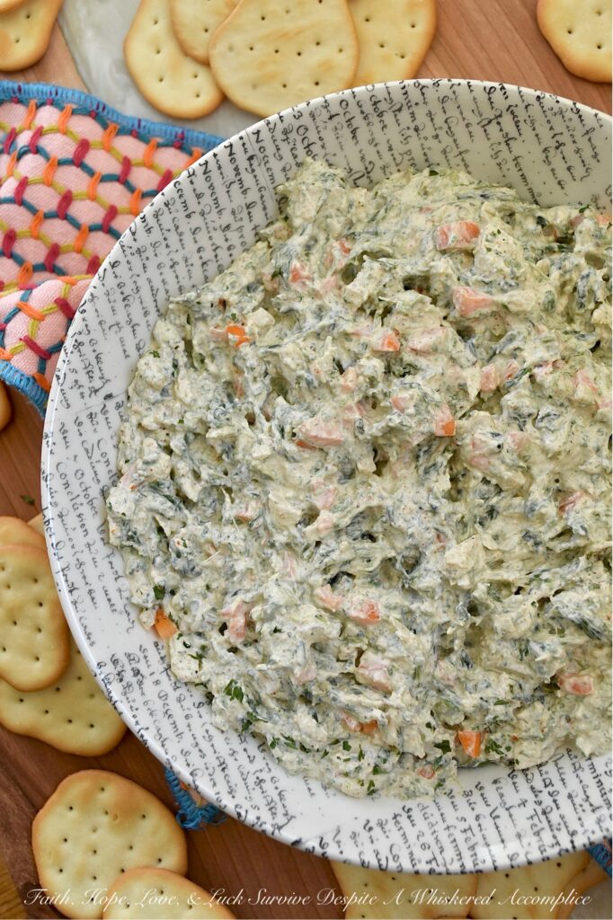 Classic Homemade Spinach Dip (No Soup Mix) - What makes this classic spinach dip truly special is its delicious homemade blend of herbs and seasonings. By skipping the packet of store-bought soup mix, you get a fresh and vibrant taste that pre-packaged versions simply can’t compete with. The result is a creamy, flavorful dip that's perfect for pairing with your favorite crackers, chips, or pretzels. This quick and easy homemade spinach dip is sure to be a hit at your next gathering.