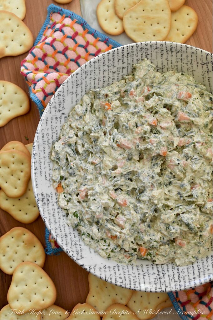 Classic Homemade Spinach Dip (No Soup Mix) - What makes this classic spinach dip truly special is its delicious homemade blend of herbs and seasonings. By skipping the packet of store-bought soup mix, you get a fresh and vibrant taste that pre-packaged versions simply can’t compete with. The result is a creamy, flavorful dip that's perfect for pairing with your favorite crackers, chips, or pretzels. This quick and easy homemade spinach dip is sure to be a hit at your next gathering.