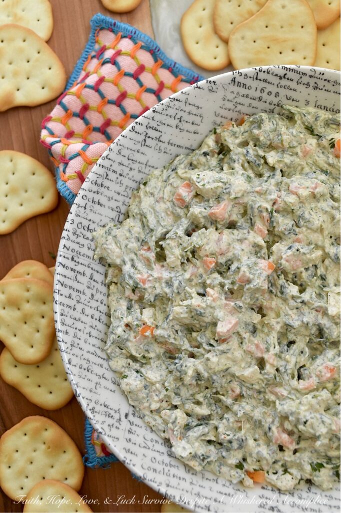 Classic Homemade Spinach Dip (No Soup Mix) - What makes this classic spinach dip truly special is its delicious homemade blend of herbs and seasonings. By skipping the packet of store-bought soup mix, you get a fresh and vibrant taste that pre-packaged versions simply can’t compete with. The result is a creamy, flavorful dip that's perfect for pairing with your favorite crackers, chips, or pretzels. This quick and easy homemade spinach dip is sure to be a hit at your next gathering.
