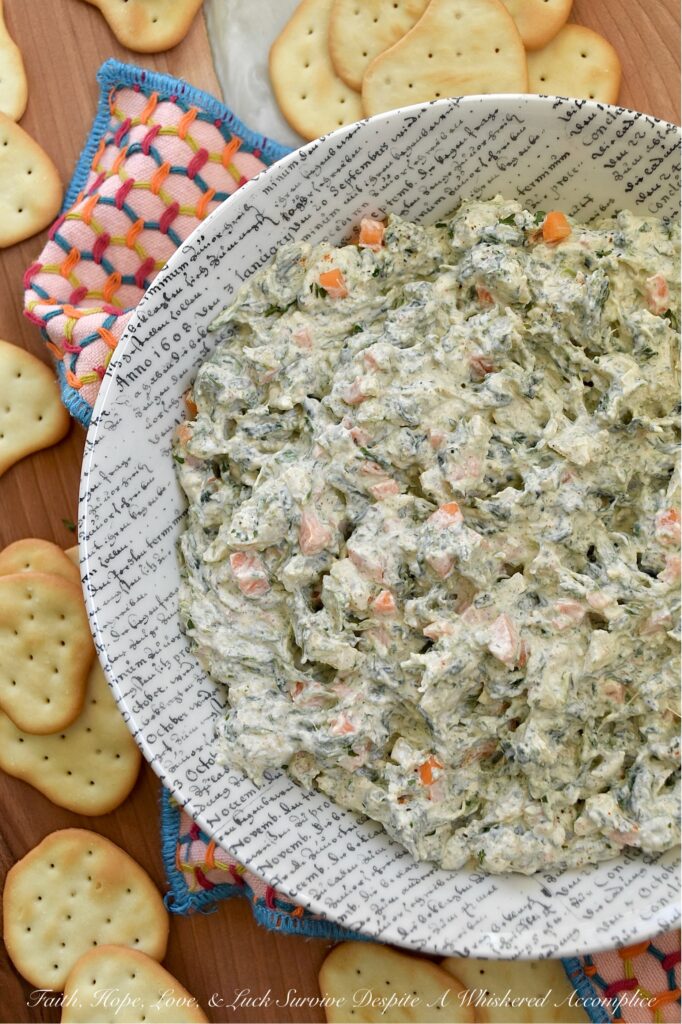 Classic Homemade Spinach Dip (No Soup Mix) - What makes this classic spinach dip truly special is its delicious homemade blend of herbs and seasonings. By skipping the packet of store-bought soup mix, you get a fresh and vibrant taste that pre-packaged versions simply can’t compete with. The result is a creamy, flavorful dip that's perfect for pairing with your favorite crackers, chips, or pretzels. This quick and easy homemade spinach dip is sure to be a hit at your next gathering.