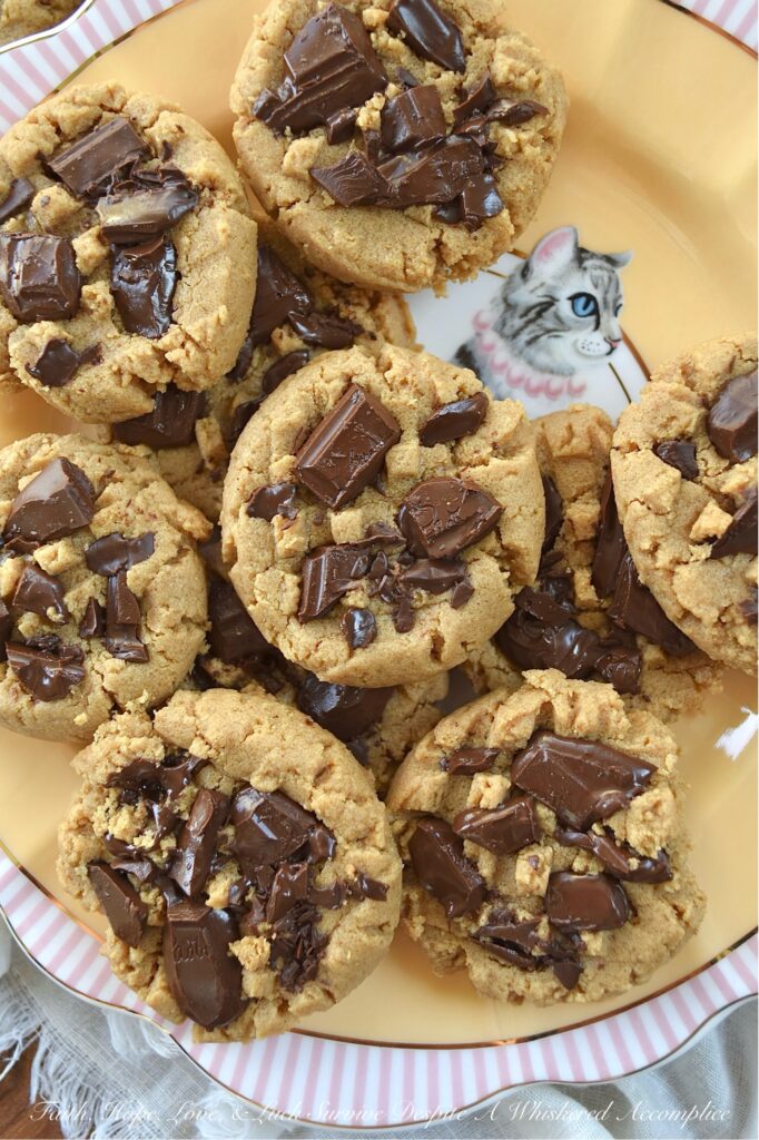 Classic Peanut Butter Cookies (Eggless Recipe) - These peanut butter cookies are a total game changer for anyone dealing with egg or gluten allergies. Rich and flavorful, not only are these eggless cookies somewhat allergy-friendly, but they're also insanely delicious, making them a fantastic treat for anyone who loves peanut butter. And, when you add a bit of dark chocolate to them while they’re still warm from the oven, it creates an amazing blend of peanut butter and chocolate that’s pretty much irresistible. The classic peanut butter and chocolate flavor combination really takes these cookies to a whole new level of yumminess.