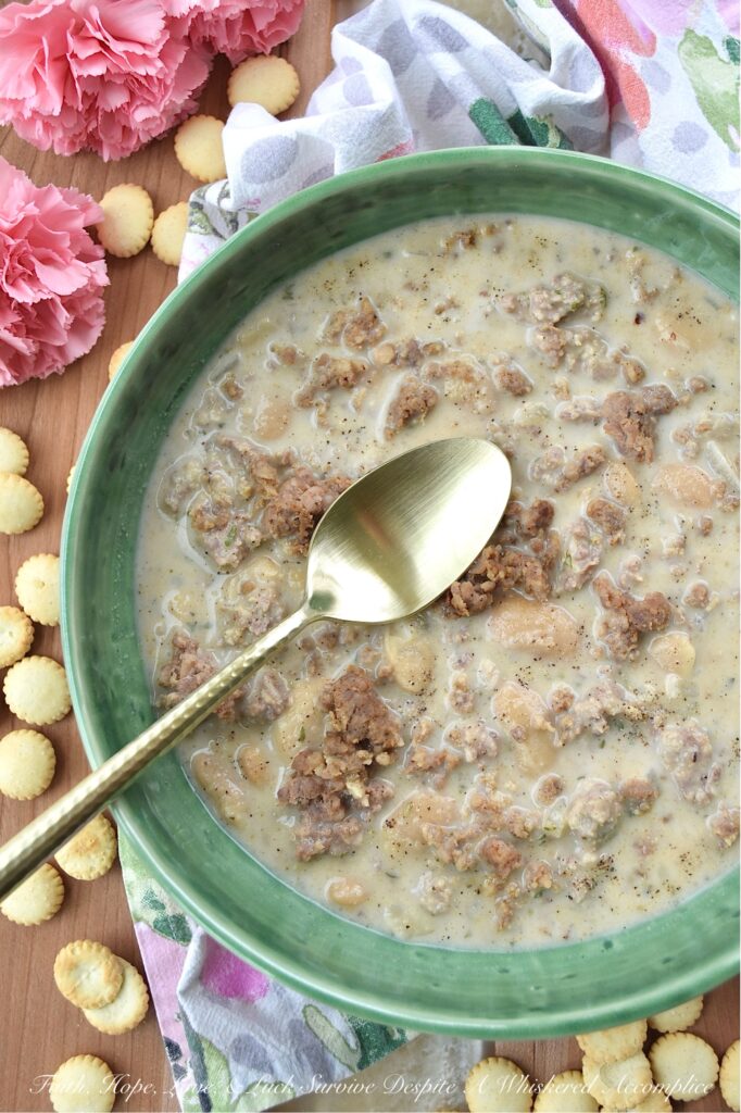 Weeknight Sausage & Butter Bean Soup - With work, family, and everything else life throws our way, finding time to prepare a satisfying and delicious meal can be tough. This flavorful sausage and butter bean soup uses simple ingredients, such as regular ground sausage and canned butter beans, to create a surprisingly quick and satisfying weeknight meal. And, for an extra indulgent touch, blending half of the soup gives it a creamy, luxurious texture that you'll absolutely adore. Get ready to add this delicious soup recipe to your weeknight dinner rotation.