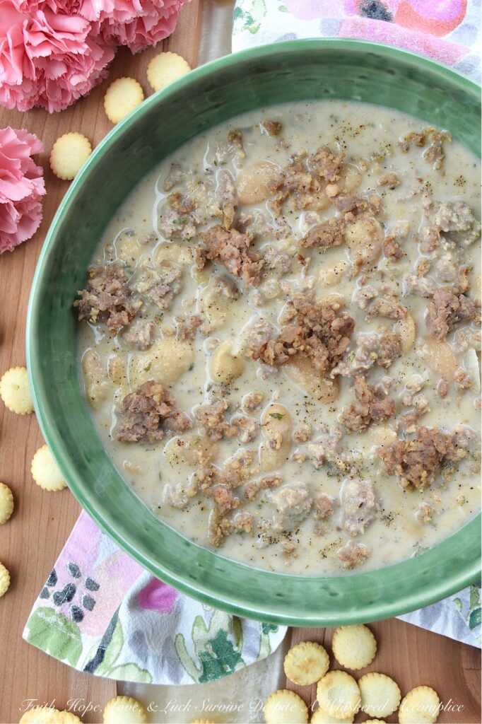 Weeknight Sausage & Butter Bean Soup - With work, family, and everything else life throws our way, finding time to prepare a satisfying and delicious meal can be tough. This flavorful sausage and butter bean soup uses simple ingredients, such as regular ground sausage and canned butter beans, to create a surprisingly quick and satisfying weeknight meal. And, for an extra indulgent touch, blending half of the soup gives it a creamy, luxurious texture that you'll absolutely adore. Get ready to add this delicious soup recipe to your weeknight dinner rotation.