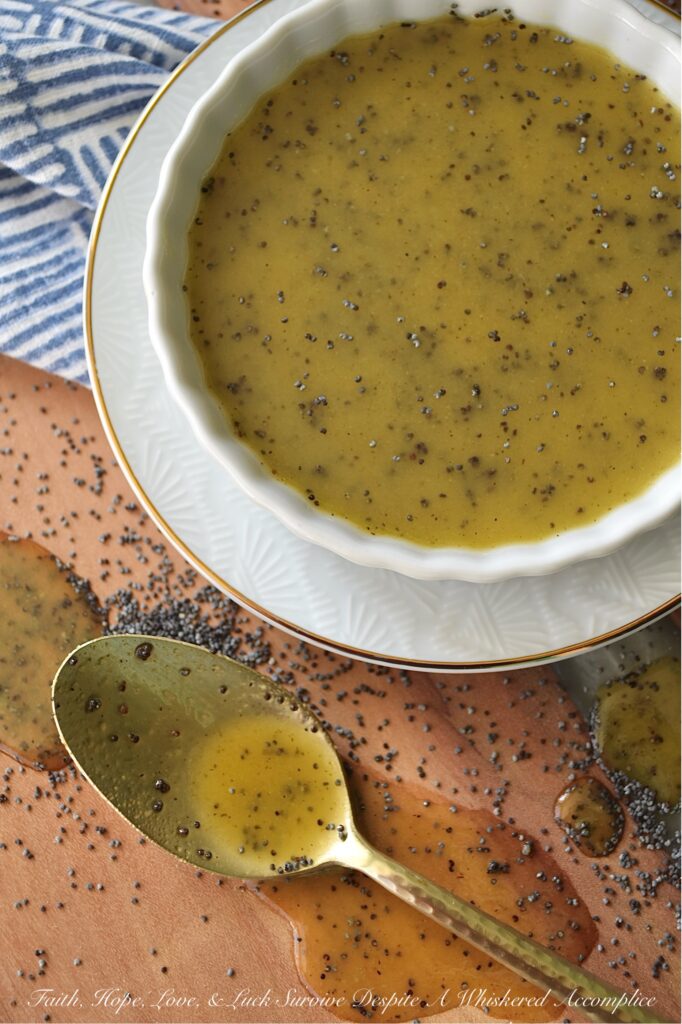 Honey Dijon Poppy Seed Salad Dressing - Are you tired of the same old boring salads? This versatile homemade poppy seed salad dressing recipe combines the sweetness of honey, the richness of olive oil, and the tangy zip of apple cider vinegar, while a touch of Dijon mustard adds depth of flavor, beautiful color, and a welcome hint of saltiness. But it's the poppy seeds that truly make this salad dressing a winner, adding a delightful texture and subtle nutty flavor. This Honey Dijon Poppy Seed Salad Dressing is also incredibly adaptable, perfect for tossing with pasta salad, adding flavor to coleslaw, or even replacing mayonnaise in your favorite potato salad.