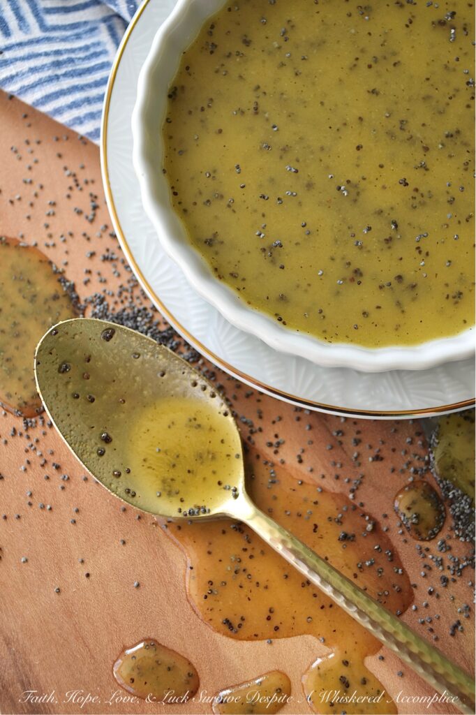 Honey Dijon Poppy Seed Salad Dressing - Are you tired of the same old boring salads? This versatile homemade poppy seed salad dressing recipe combines the sweetness of honey, the richness of olive oil, and the tangy zip of apple cider vinegar, while a touch of Dijon mustard adds depth of flavor, beautiful color, and a welcome hint of saltiness. But it's the poppy seeds that truly make this salad dressing a winner, adding a delightful texture and subtle nutty flavor. This Honey Dijon Poppy Seed Salad Dressing is also incredibly adaptable, perfect for tossing with pasta salad, adding flavor to coleslaw, or even replacing mayonnaise in your favorite potato salad.