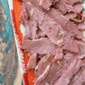 Guinness Stout Crockpot Simmered Corned Beef - Forget complicated recipes and wasted hours spent in the kitchen. With just five simple ingredients and the help of your trusty crockpot or slow cooker, you can transform a tough corned beef brisket into a melt-in-your-mouth masterpiece. This slow-cooked corned beef is simmered to perfection with Guinness Draught Stout, whole black peppercorns, sliced sweet yellow onion, and just enough water to cover the brisket, along with the traditional spice packet that comes with it. The result? A tender, juicy corned beef brisket, ready to be sliced and enjoyed with your favorite sides for a truly unforgettable meal.